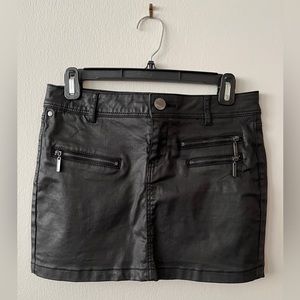 Mini black leather skirt
